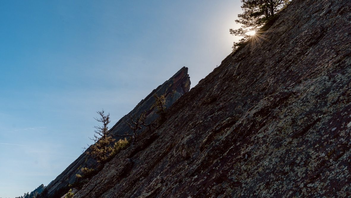 First light on a Flatirons ridgeline above Boulder, Colorado